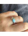 An.tipo cartier c/turquesa reconsitiuida oval  5 mm x 8 mm