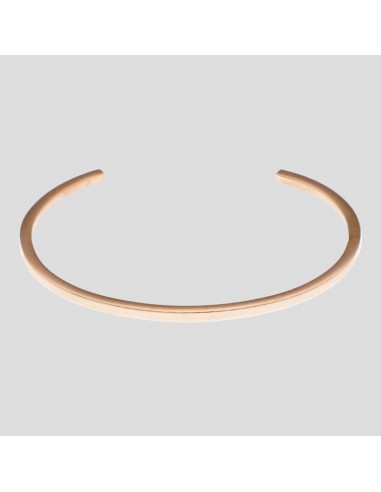 Brazalete en acero con baño en oro...