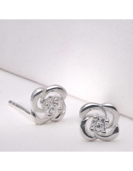 Tor.tipo flor c/diamante en el centro de 0.2ct / 3mm x 2pcs