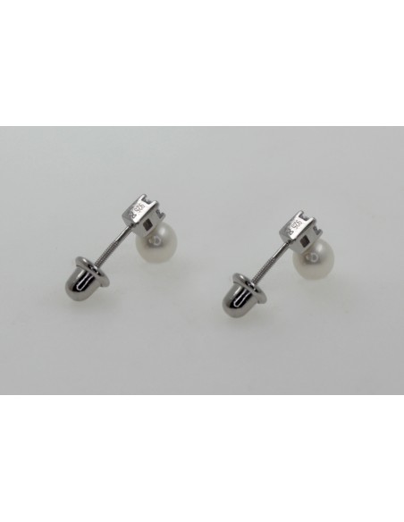 Tor. zc con perla cultivada 5-5.5 mm Largo 8mm